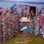 Widows in uniform ankara attire cutting a cake at PAPADEF 2026 International Widows' Day, Ado-Odo Ota, Ogun State